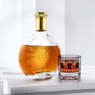 Persoonlijke ronde onregelmatige glad oppervlak glasfles voor de productie van 700 ml gin whisky