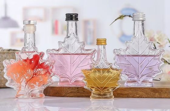 Persoonlijke kleur Industriële glazen drankfles met vorm van esdoornblad 50 ml 100 ml 250 ml